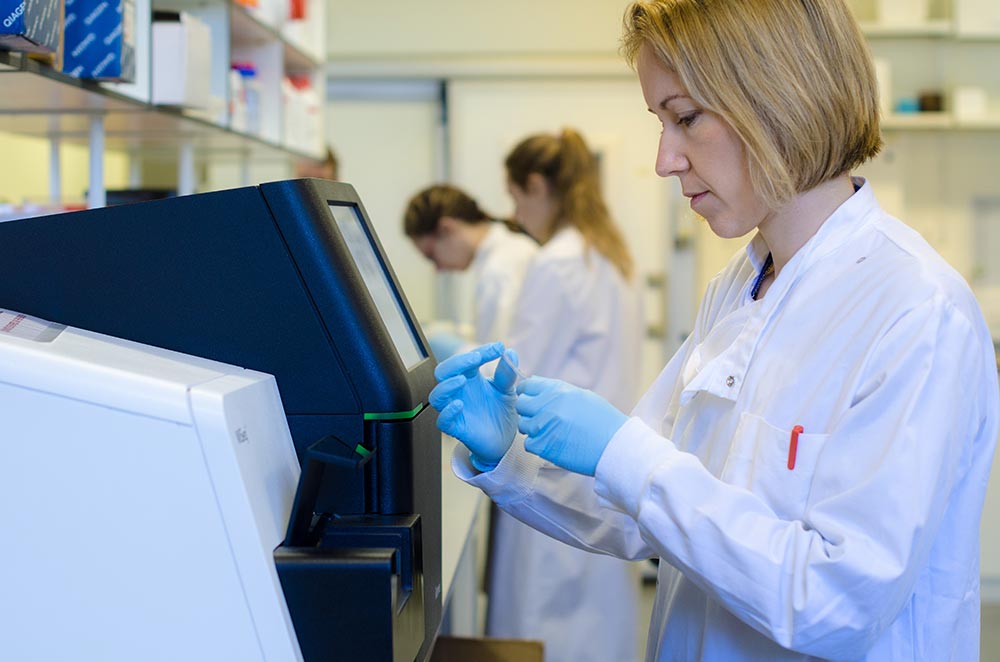 researcher preparing a sample
